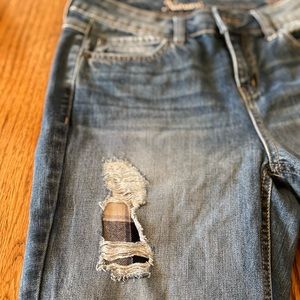Women’s boyfriend jeans with flannel patchwork